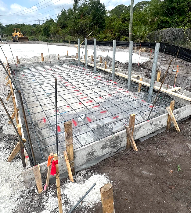 SLP Concrete & Construction – About Us SLP Concrete & Construction team building a concrete foundation